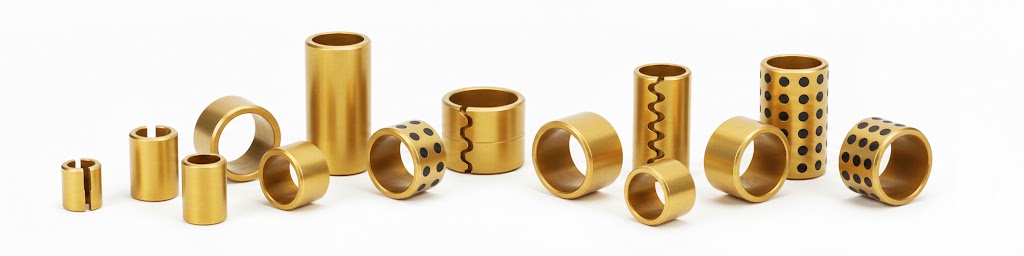 Precision-machined Gunmetal Bronze Bearings with bright golden finish and graphite plug options on a pure white background.